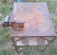 Small workbench with Craftsman vise mounted.