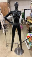 Aluminum mannequin on stand. 71 inches tall