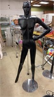 Aluminum mannequin on stand. 71 inches tall