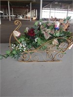 Decorative Christmas sleigh with flowers