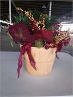 Decorative basket with plastic flowers