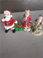 3 Santa Claus figurines