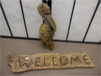 Carved Wooden Pelican and Welcome Sign