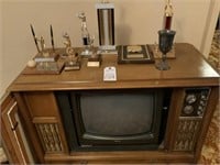 Trophies And Silver Cup And Tv