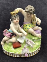 Porcelain Cupid Figurine