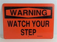 "Warning Watch Your Step Sign"