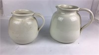2 White Porcelain Pitchers