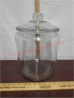 Large glass jar with lid.