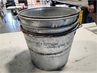 3 small metal pails