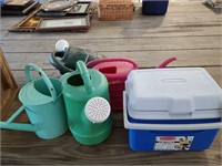 Rubbermaid cooler & 4 sprinkling cans