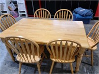 Wooden dining room table & 6 chairs