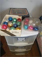 Plastic organizer and vintage Christmas bulbs.