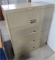 4 Drawer metal filing cabinet. Measures 51.5" H x