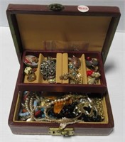 Jewelry box with contents including necklaces,