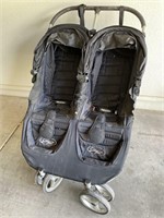 Folding Two Seat Black Canvas Stroller