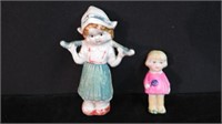 2PC PORCELAIN DUTCH FIGURE AND GIRL WITH LOLLIPOP