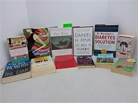Various hard and soft cover books