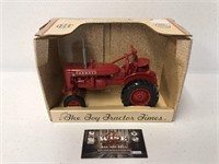 Farmall a toy tractor times Osage Iowa