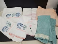 Lot of pastel towels. Some brand new with tags