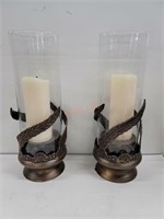 Pair of heavy ornate candle holders