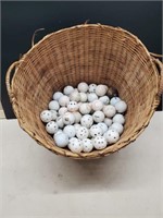 Basket of golf and whiffle balls