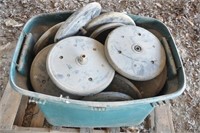 Tub of used Kinze press wheels