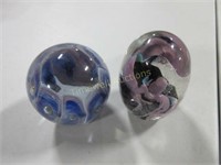 Two paperweights