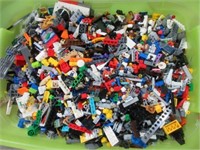 4 L tote full of LEGO figures, vehicles and more