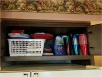 CONTENTS OF CABINET ABOVE FRIDGE