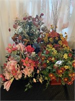 Four artificial floral arrangements.