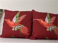 Five decorative pillows.