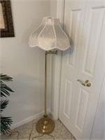 Brass floor lamp.