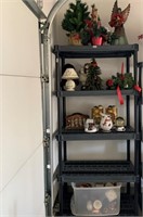Four Shelves of Christmas Decorations.