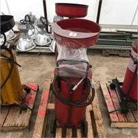 #4554   Pallet With 2 Red Oil Drain Caddies