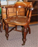 Solid walnut carved arm chair, turned legs