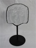 Nordic solid glass face in pedestal with wrought