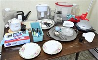 lot to include serving pieces, kitchen gadgets,
