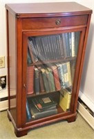 mahogany glass door bookcase with top drawer,