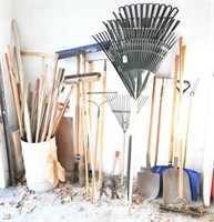 large lot of assorted long handled tools to