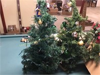 2 small lighted Christmas trees & box of garland