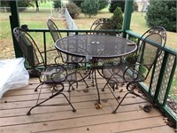 Metal patio table & 4 rocker chairs