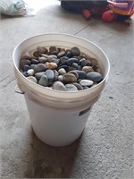 Bucket of garden stones