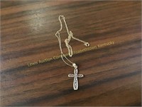 Gold chain and cross weighing 1.0 gram
