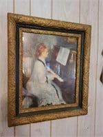 Antique painting of a women playing piano