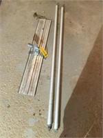 Concrete tool with poles