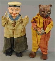 TWO PERFORMING TOY FIGURES