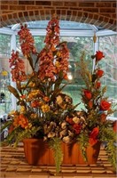 Floral arrangement in ceramic pot