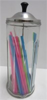 Glass straw dispenser.