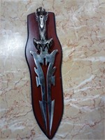 Sword on wall plaque
