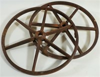 TWO CAST IRON CART WHEELS